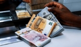 Changing Money in Uganda